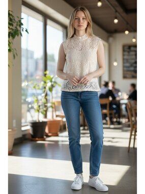 Nannette? Sleeveless Ivory Lace Top With High Neck & Floral Pattern Design